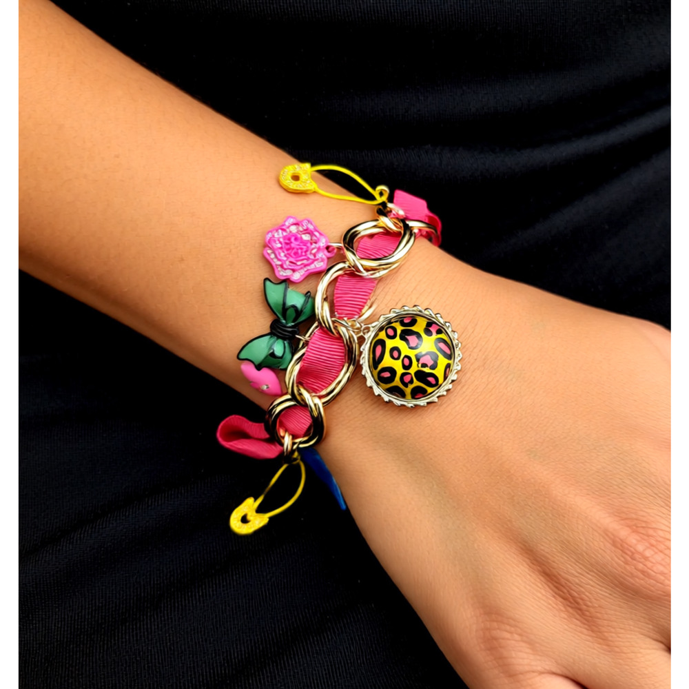 Betsy Johnson eccletic Whimisical charm breacelet with ribbon